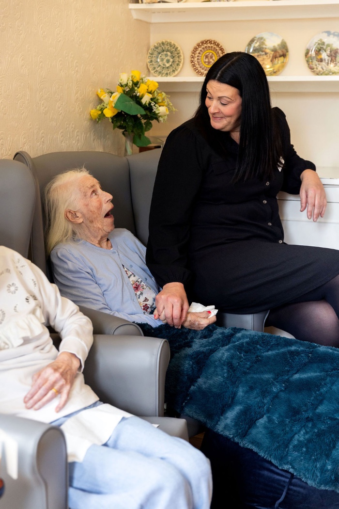 Clare with a resident